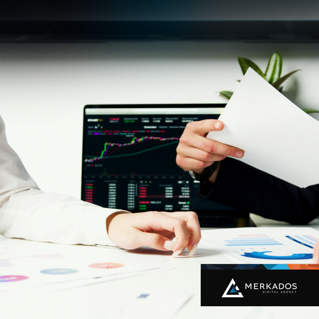 Two people review analytics and data